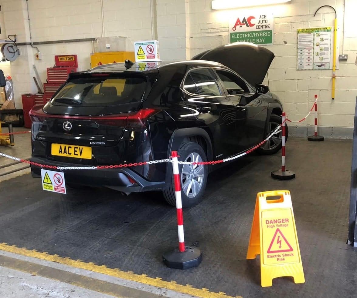 An electric vehicle on the ramp in Ace Auto Centre's dedicated EV bay